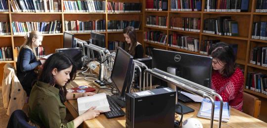 students in the library studying