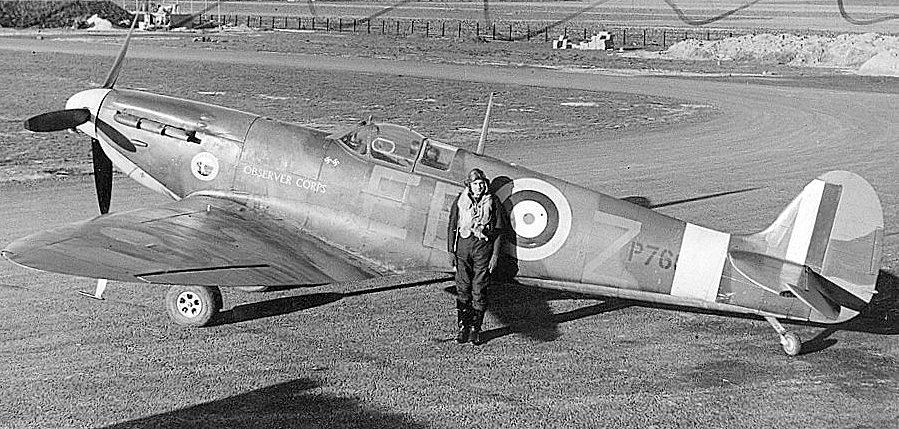 Squadron Leader D.O. Finlay, the Commanding Officer of No. 41 Squadron RAF and former British Olympic hurdler, standing by his Supermarine Spitfire Mark IIA Observer Corps, at Hornchurch, Essex (UK)